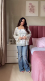 Women’s Ethnic and Casual Printed Tops Set – Red Sleeveless Peplum Kurti with Tassel Hem Paired with White Palazzo Pants & White-Blue Floral Long Sleeve Top with Tasse