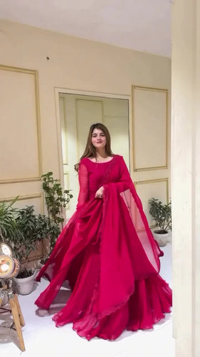 Flowing Red Anarkali Gown with Sheer Dupatta and Delicate Lace Detailing – Perfect for Weddings, Festive Events, and Special Occasions