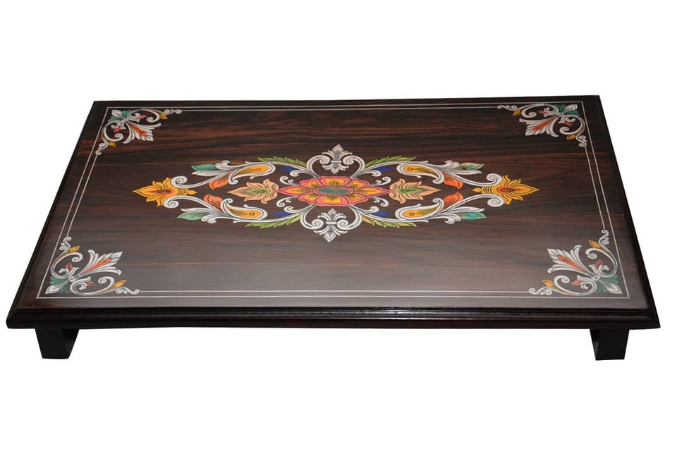 puja mane (seater). It has coloured wooden pieces inlaid in it.