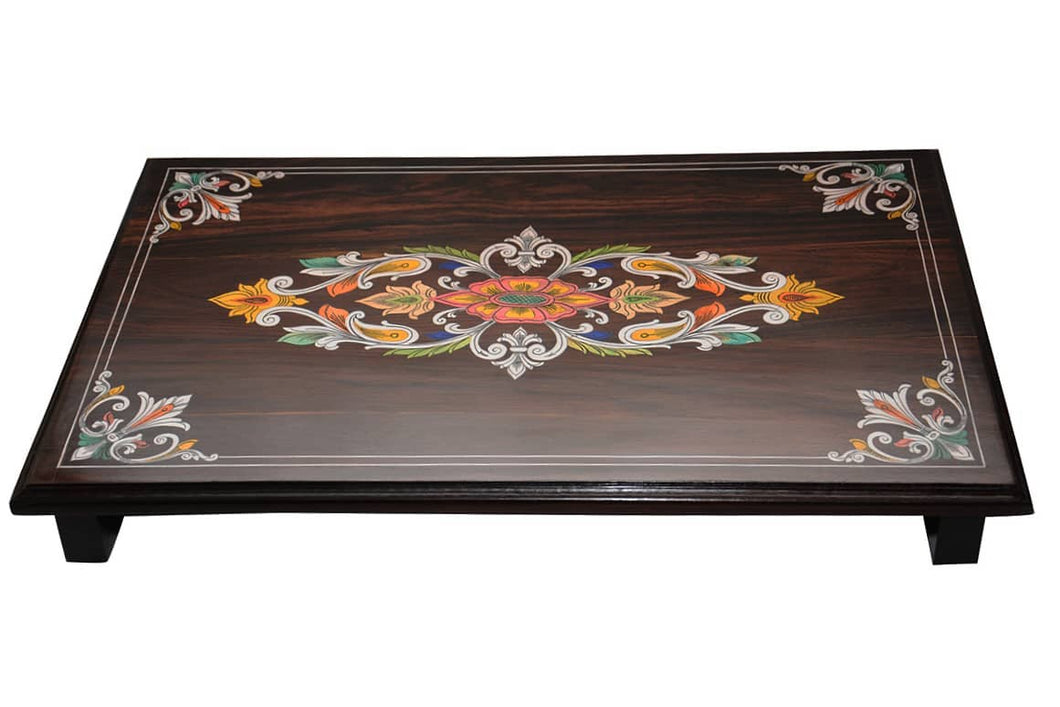 puja mane (seater). It has coloured wooden pieces inlaid in it.